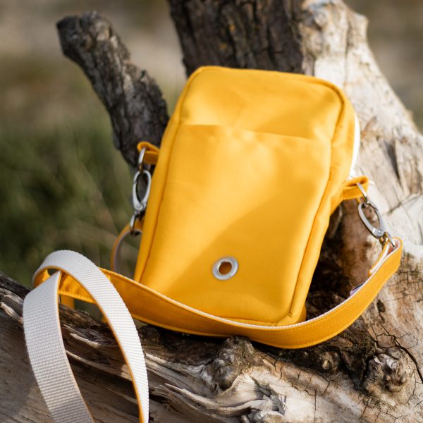 Wandeltasje met poepzakdispenser voor hondenbaasjes.